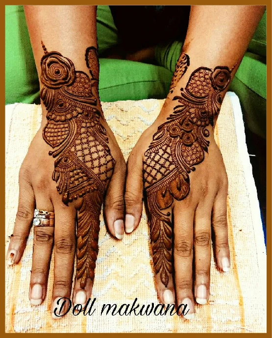 Stylish Back Hand Mehndi Art With Netted Pattern From One Finger